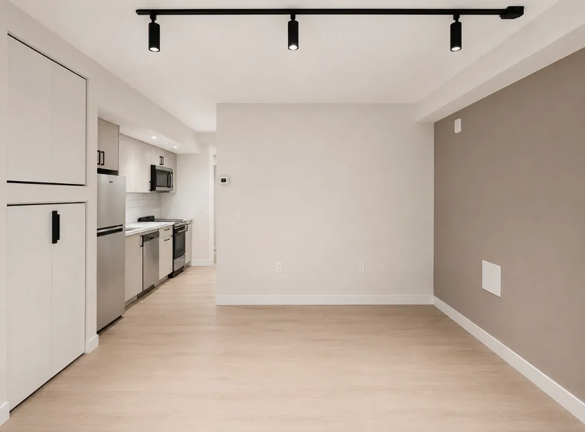 Studio living and kitchen with a light finish palette at The Ranstead.